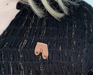 The wonderfully imperfect Boobies pin